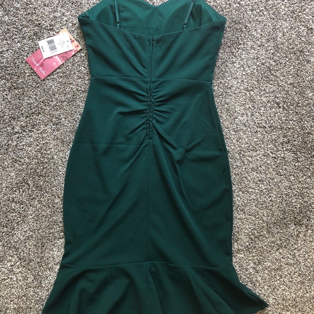 Peplum spruce green cocktail dress